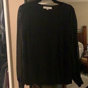 Sweater with sheer sleeves